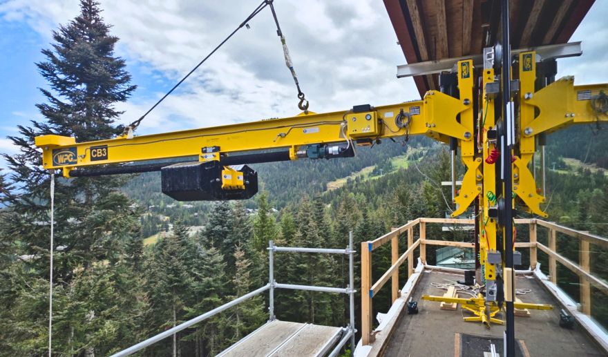 Kadenwood Drive, Whistler. A counterbalance beam and Powercup rigged over the deck to glaze RAICO Therm+ A-I curtain wall.