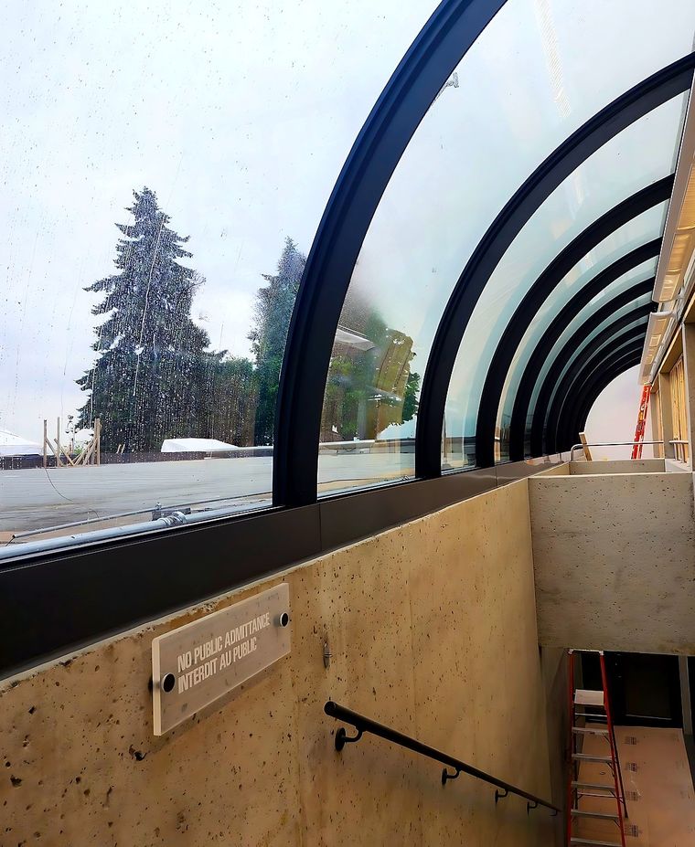 UBC Museum of Anthropology. RAICO Therm+ S-I curved steel façade seen from inside the cafeteria.